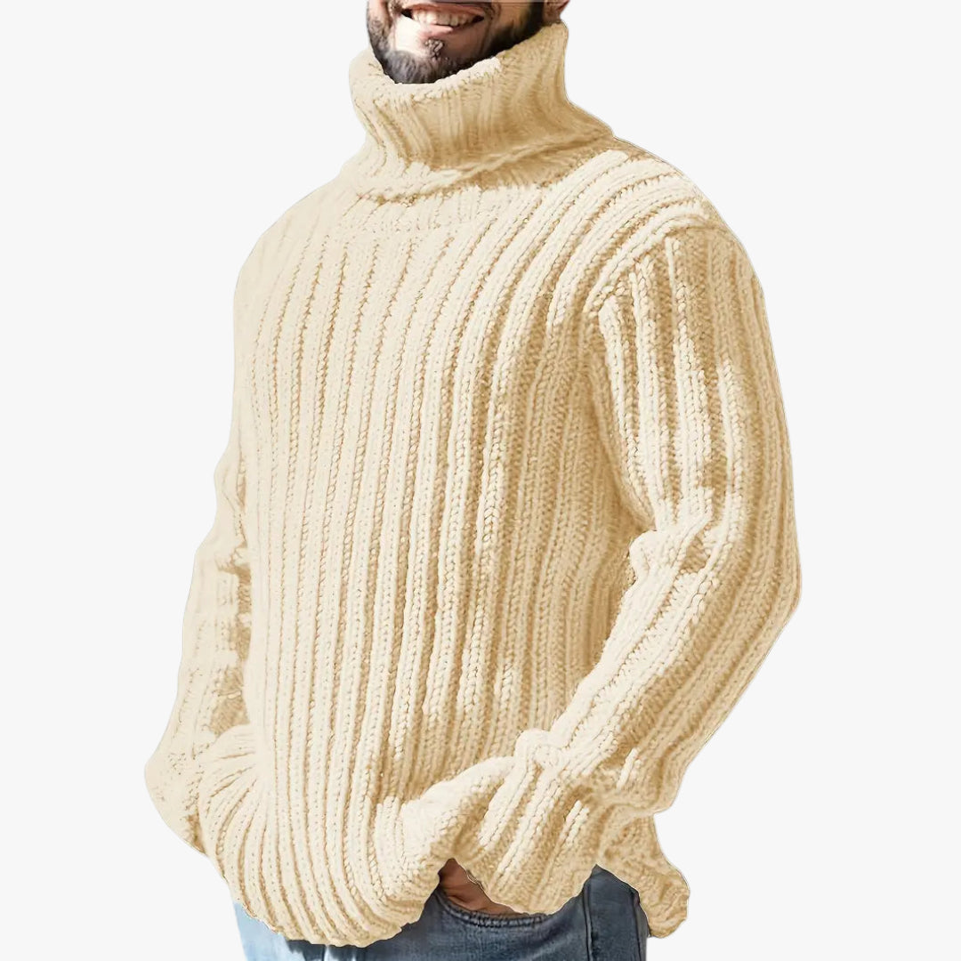 Man wearing a beige turtleneck sweater on a white background