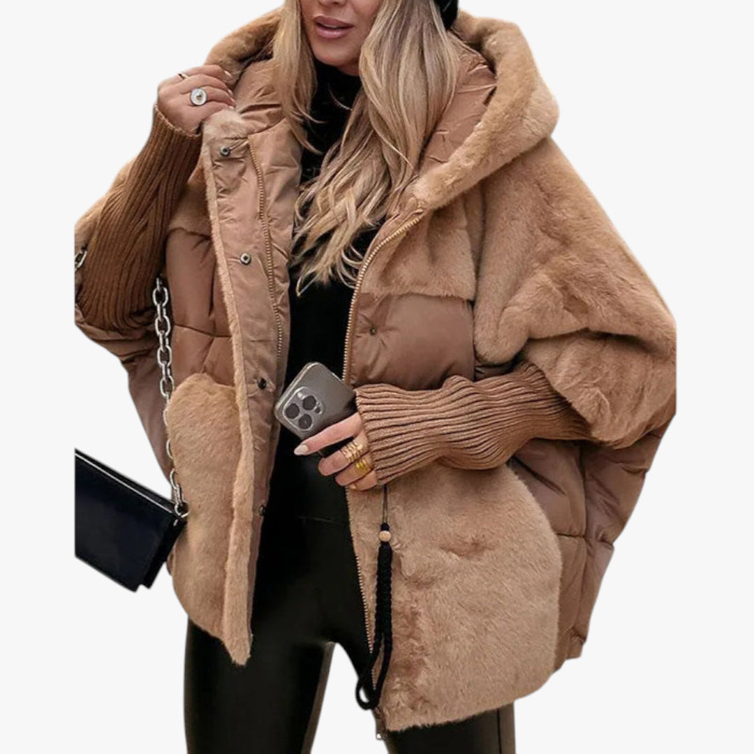 Person wearing a brown puffer jacket with a white background