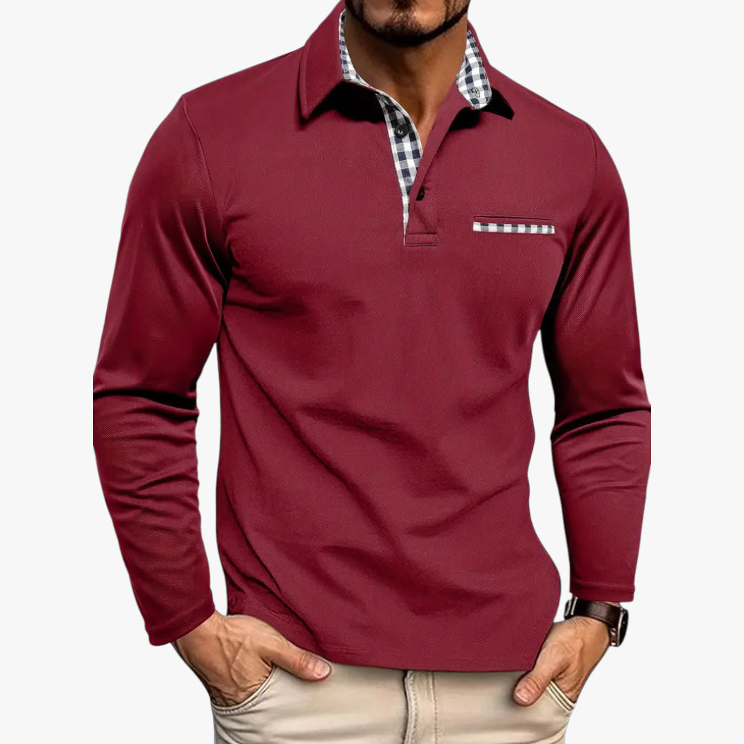 Red long-sleeve polo shirt with plaid accents worn by a person on a white background